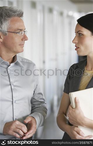 Businessman and Woman in Office