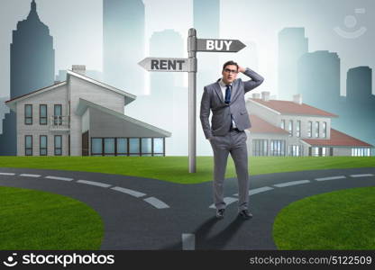 Businessman at crossroads betweem buying and renting