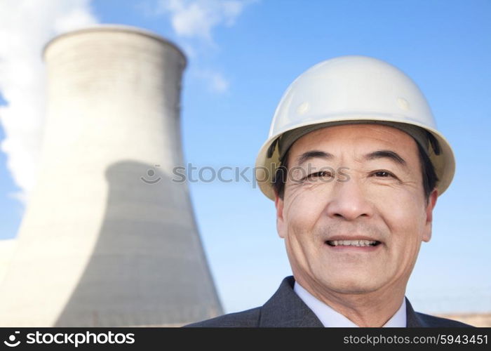 Businessman at power plant