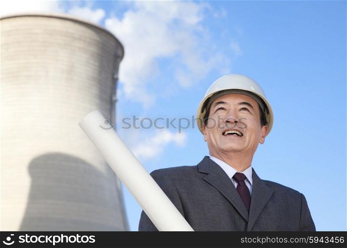Businessman at power plant