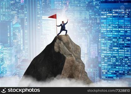 Businessman at the top of mountain 
