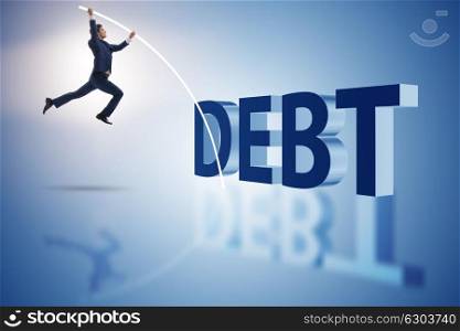 Businessman avoiding debt burden in business concept