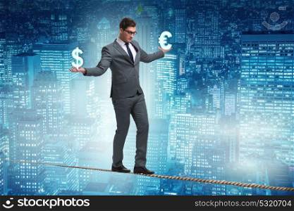 Businessman balancing between choosing dollar and euro