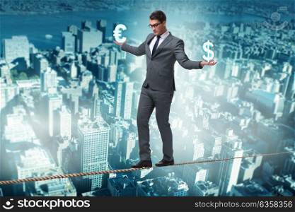 Businessman balancing between choosing dollar and euro
