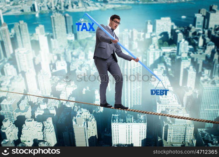 Businessman balancing between debt and tax