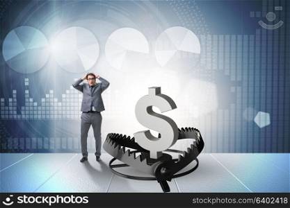 Businessman being trapped by dollar