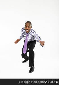 Businessman bending forward in studio