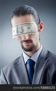 Businessman blinded with money