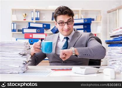 Businessman busy with much paperwork