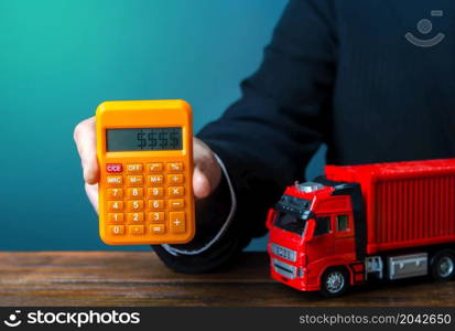 Businessman calculates the cost of shipping a container. Rising prices, global containers shortage crisis. Import and export. Cargo transit. Transportation inflation, shipping rates. Priced out