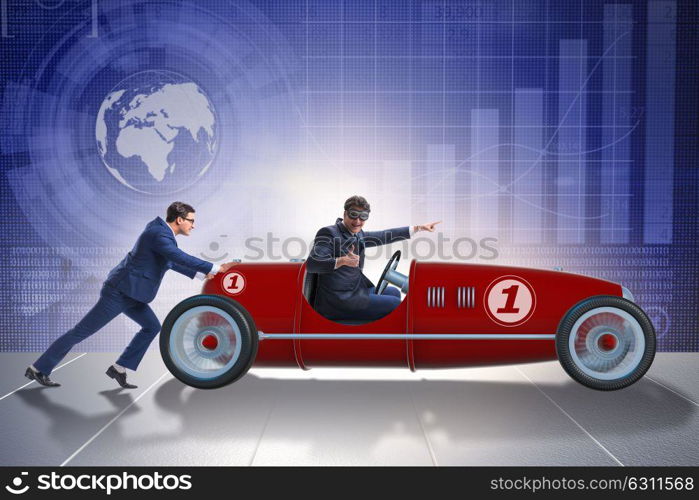 Businessman car pushing in teamwork concept