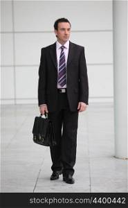 Businessman carrying a briefcase