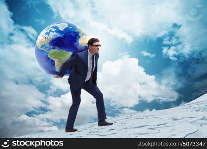 Businessman carrying Earth on his shoulders