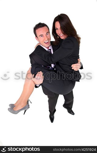 Businessman carrying his partner