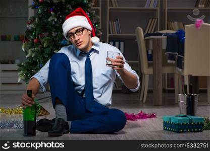 Businessman celebrating christmas at home alone