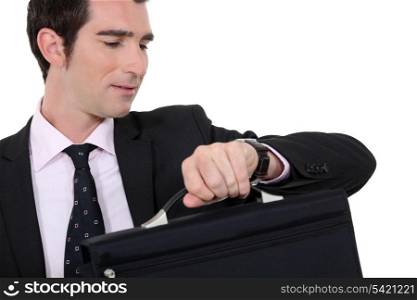 Businessman checking he is not late