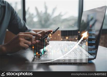 Businessman checking stock market analysis graph report on his laptop and mobile phone using trading apps. Forex trading and investment concept.
