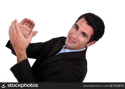 businessman clapping his hands
