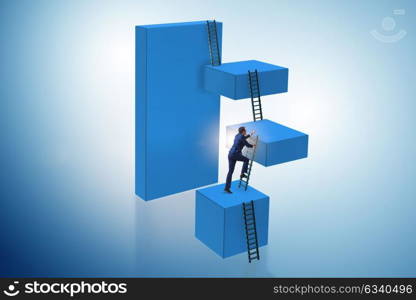 Businessman climbing blocks in challenge business concept