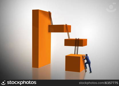 Businessman climbing blocks in challenge business concept