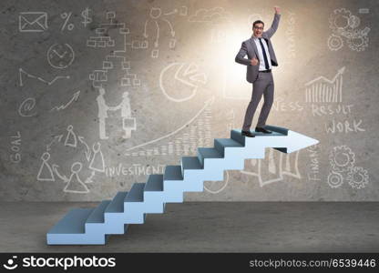 Businessman climbing career ladder in business concept