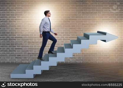 Businessman climbing career ladder in business concept