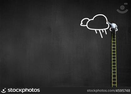 Businessman climbing ladder to top and touching cloud. Reaching top
