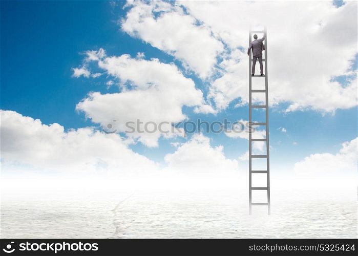 Businessman climbing stairs against the sky
