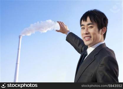 Businessman Collecting Smoke in Beaker