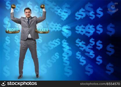 Businessman comparing profit and taxes