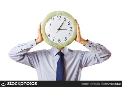Businessman covering his face with clock