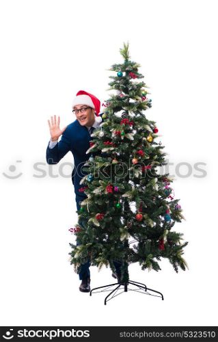 Businessman decorating christmas tree isolated on white
