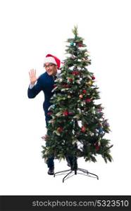 Businessman decorating christmas tree isolated on white