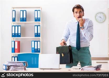 Businessman disgusted with cockroaches in the office