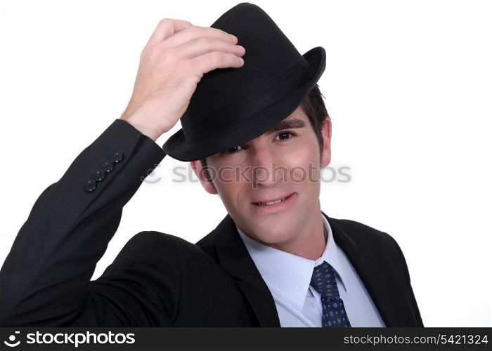 Businessman doffing his hat