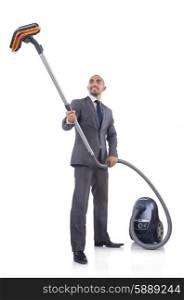 Businessman doing vacuum cleaning on white
