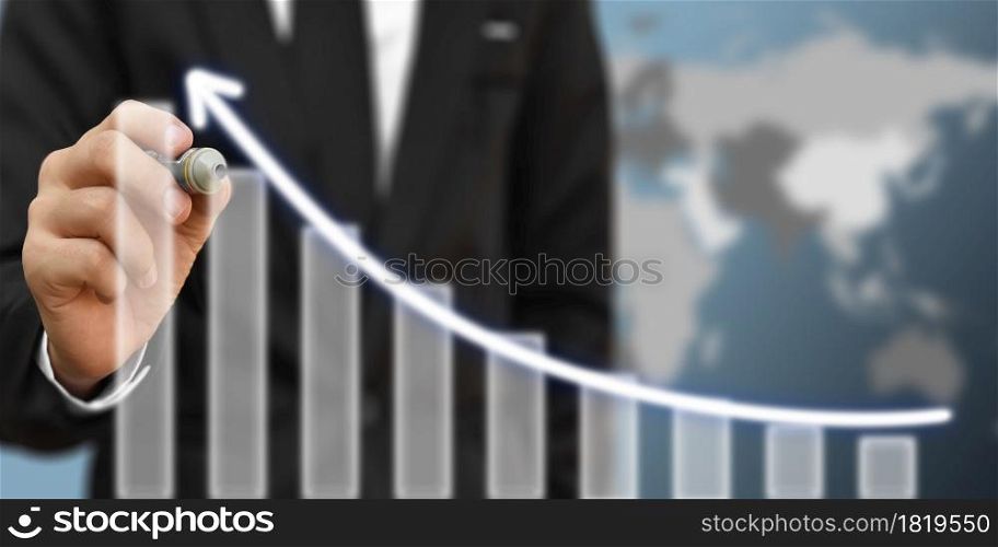 Businessman drawing arrow on screen graph corporate future growth plan. Concept of business development and growth. Elements of this image furnished by NASA