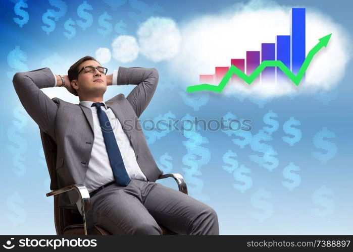 Businessman dreaming of stock market recovery