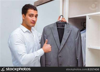 Businessman dressing up for work