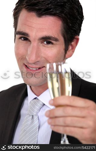 businessman drinking champagne