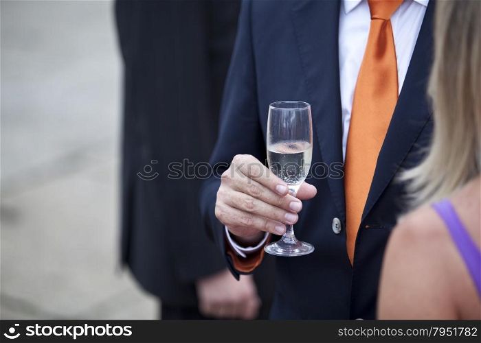 Businessman drinking champagne