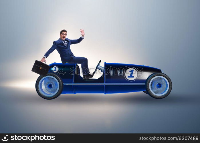 Businessman driving car in competition concept