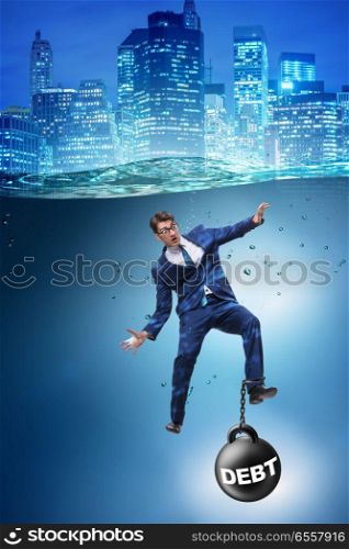 Businessman drowning in concept of high debt