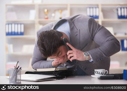 Businessman during fire alarm in office