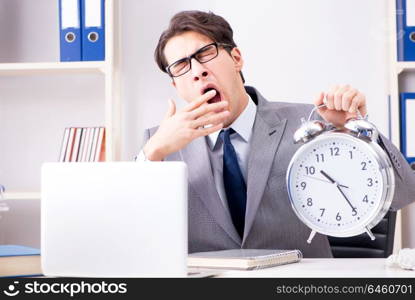 Businessman employee in urgency and deadline concept with alarm clock. Businessman employee in urgency and deadline concept with alarm