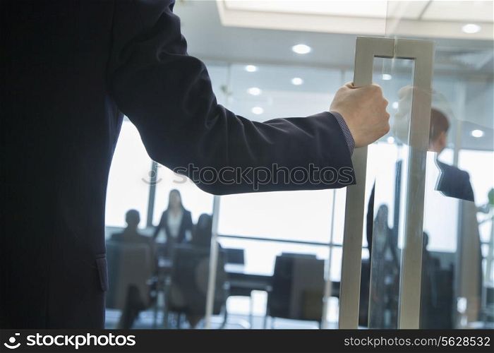 Businessman Entering an Office