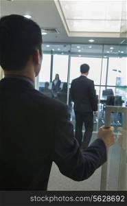 Businessman Entering an Office