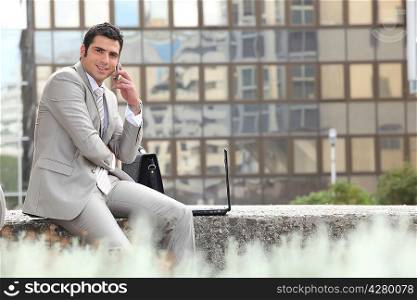 Businessman escaping the office