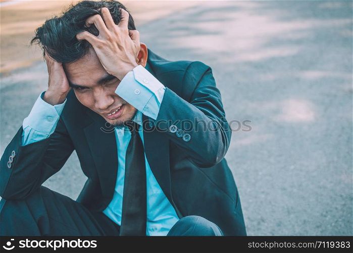 Businessman fail work and Business,Business people sit stressful and headache