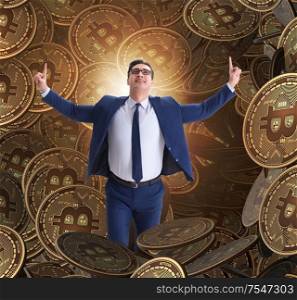 Businessman falling into sinkhole of cryptocurrency bitcoin. The businessman falling into sinkhole of cryptocurrency bitcoin